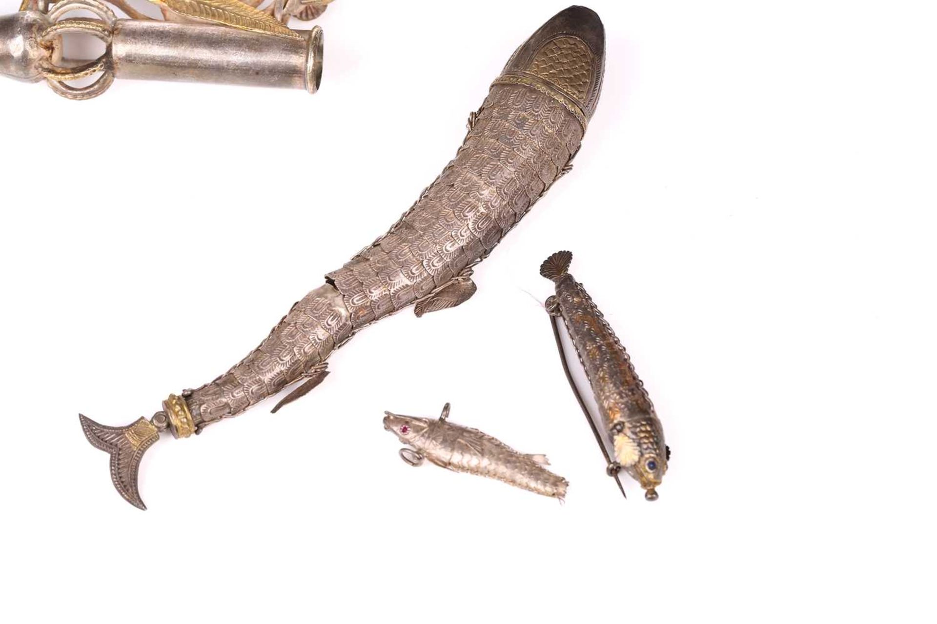 An Indo-Persian white metal opium pipe moth pipe with opium poppy and bird finial and scrolls, 11. - Image 2 of 6