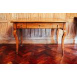 A 19th-century style French walnut side table, three frieze drawers on cabriole legs, 109 cm wide