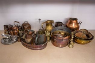 A large quantity of brass, pewter and copper items, to include pans, bowls, a milk churn,