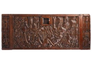 A late Gothic boarded oak coffer front, carved with scenes of St George slaying the dragon with