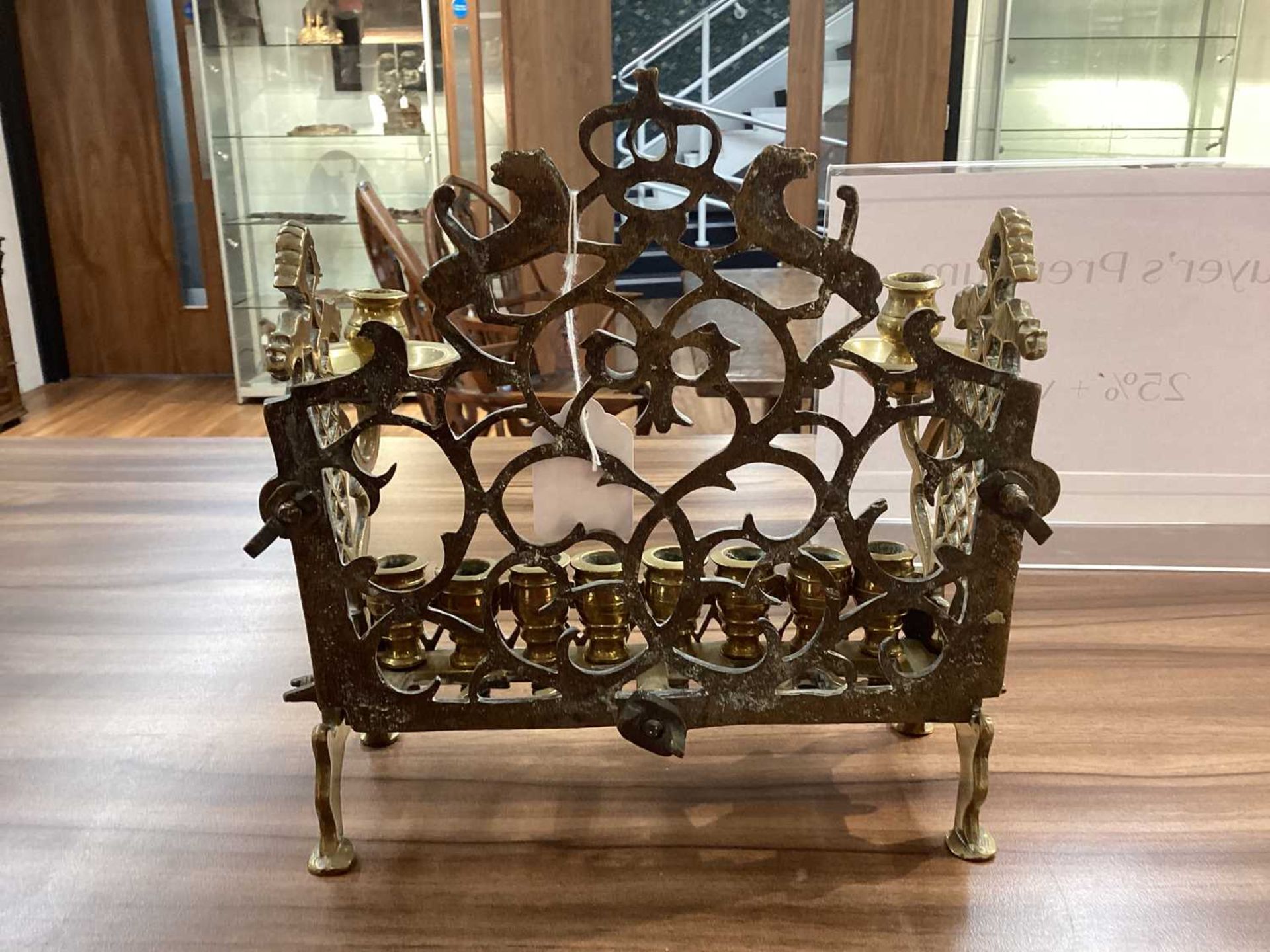 An 18th century Dutch/German brass menorah, with row of eight sconces and side lights, fretwork - Image 4 of 8