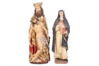 A 20th century carved and painted softwood religious figure of The Holy Father holding up his