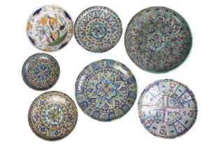 An Eastern tin-glazed footed circular dish possibly Moroccan Fez late 19th/20th century, painted