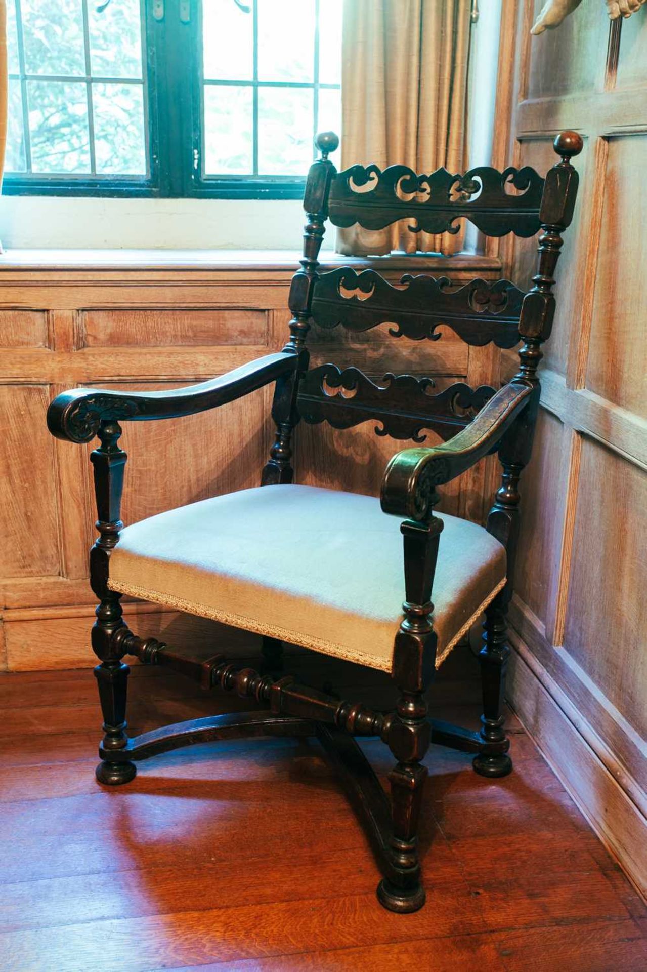 An oak frame open armchair, probably Flemish late 17th century (restorations), 112 cm high x 63 cm