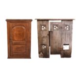 A 19th century oak hanging cupboard, with twin panelled door enclosing shelves, 66 cm wide, 103 cm