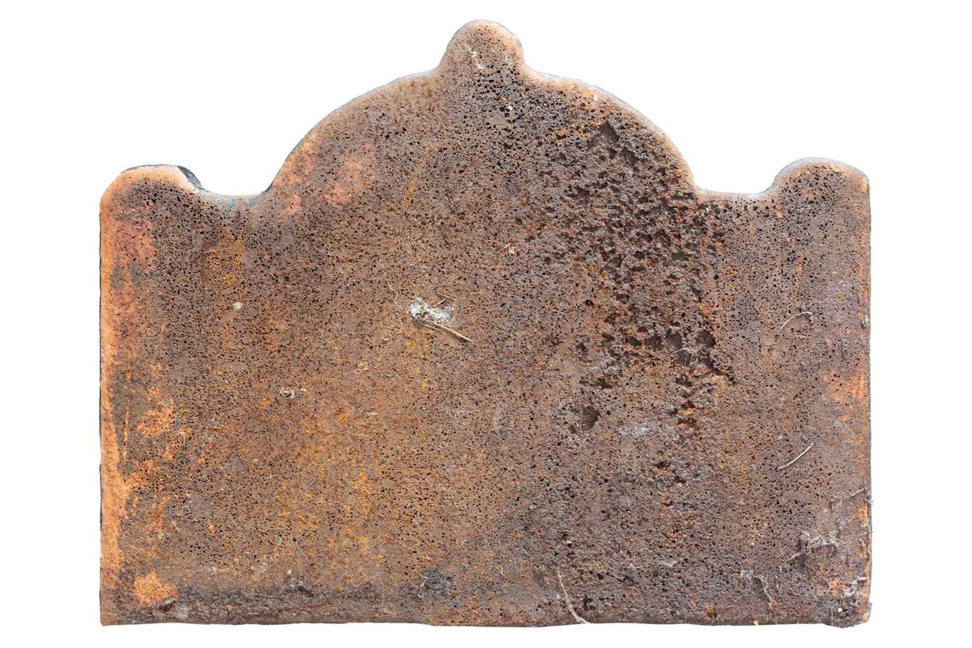 A 17th century style cast iron fire back, the shaped top over a relief decorated panel depicting - Image 2 of 2
