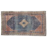 A large blue ground "old country house" Fereghan carpet with a central diamond on a field of