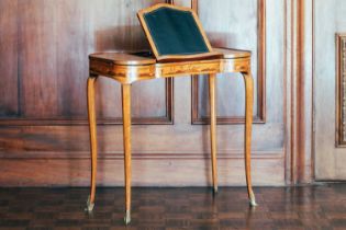 A Louis XVI style parquetry inlaid lady's writing desk, 19th century, the central ratchet writing