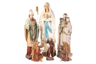 Four large 20th-century carved and polychromed statues of saints, the largest 149 cm, together