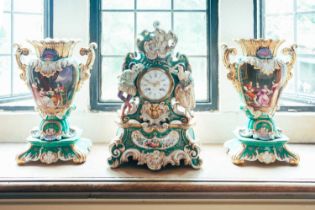 A mid-19th century French porcelain clock garniture, unmarked but probably Jacob Petite the clock