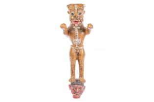 An Indian painted and carved wood figure of a crowned tiger, standing on his hind legs with arms
