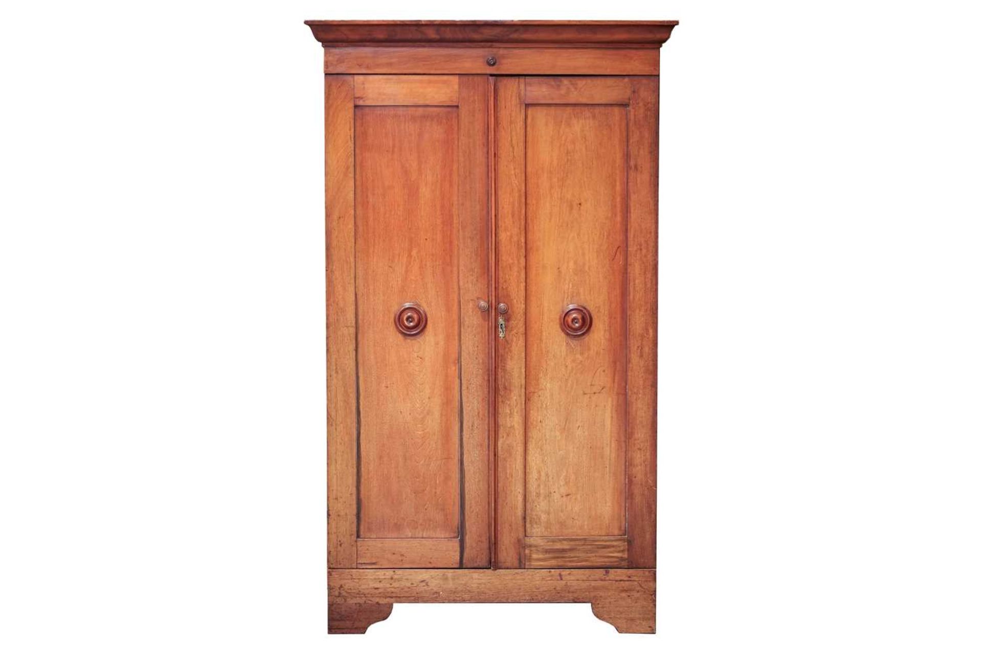 A Victorian mahogany twin door cupboard, the cavetto moulded cornice with a single roundel applied - Image 2 of 4