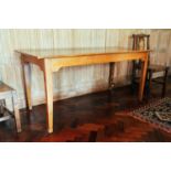 A 19th-century ash rectangular kitchen table, 168 cm x 70 cm x 73 cm high. Provenance: The