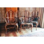 Four 18th-century style Gothic Windsor yew armchairs, probably 19th century, on cabriole front