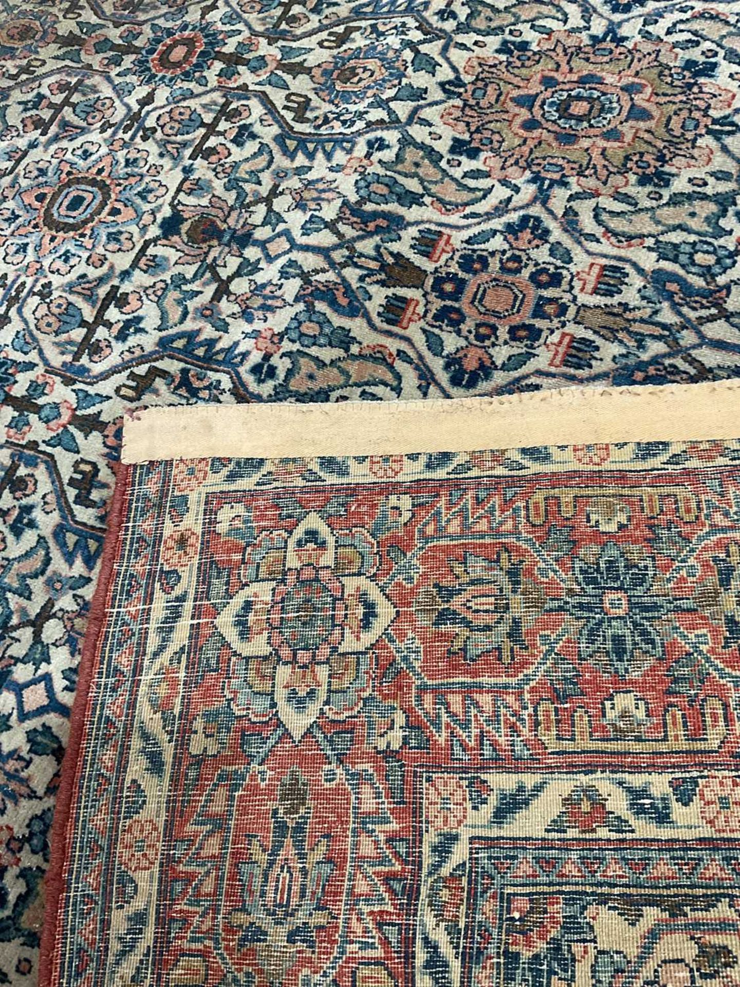 An antique ivory ground Kerman rug with an allover floral design within multiple borders 202 x 137cm - Image 9 of 10