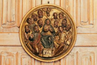 A 16th-century Spanish gilt and polychromed tondo, depicting the Virgin Mary and Saints, 26 cm