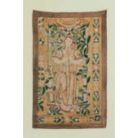 A 17th-century Flemish tapestry fragment panel, depicting an angel amongst floral motifs, 79 cm x 50