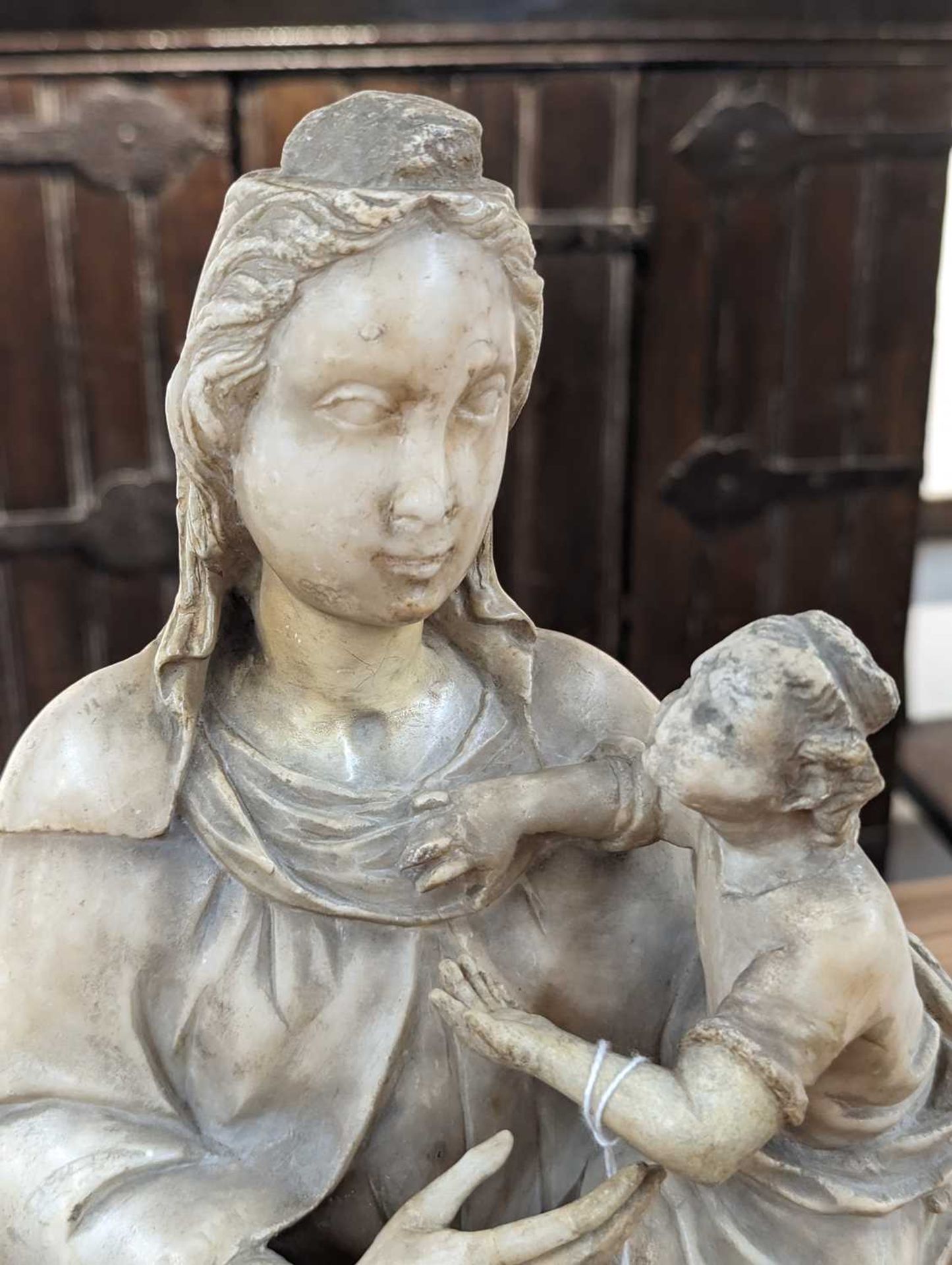 A 16th/17th-century alabaster carving of the Madonna and Child (Mary lacking a crown), depicted - Image 26 of 35
