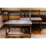 A close pair of rustic oak window seats, French, 19th century with open backs over solid seats and