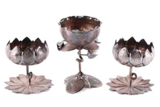 A white metal Kashmir garniture serving bowl set, in the form of water lilies all over profusely