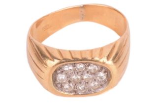 A diamond-set signet style ring, the oval ring head pavé-set with brilliant-cut diamonds, to