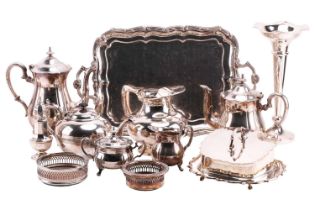 A quantity of silver plate comprising a two-handled tray, a four-piece tea and coffee service, a