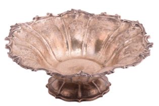 A large silver fruit bowl by Edward Barnard & Sons Ltd, of lobed round form with leaf and C scroll