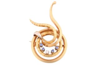 A bi-colour spiral abstract brooch comprising four sapphires and one diamond, ranging in size from