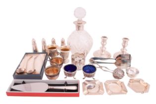 A mixed collection of silver and plate comprising a Garrard silver mounted decanter, a pair of