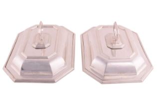A pair of silver entree dishes, covers and bayonet fit removable handles of cantered rectangular