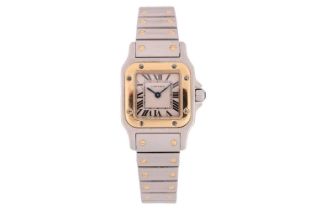 A lady's bi-colour Cartier Santos Galbée wristwatch Model: 1567 Serial: 768278CD Year: 1976 Case