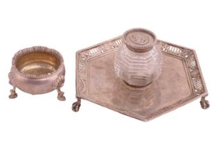 A Victorian silver inkwell on stand; the hexagonal stand with raised bar-pierced and swag chased