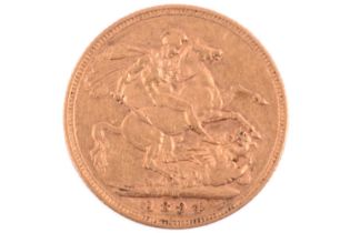 An 1894 Queen Victoria full sovereign, old head to the left, St. George and the Dragon reverse.