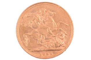 An 1899 Queen Victoria full sovereign, old head to the left, St. George and the Dragon reverse.