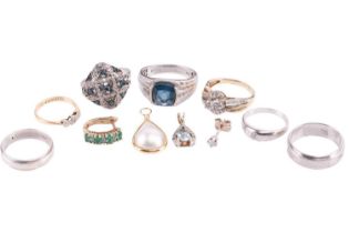 A small selection of mixed jewellery items; including examples of a topaz and diamond pendant in 9ct