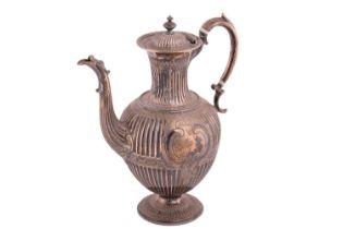 A Victorian silver coffee pot, by Martin Hall & Co. the flared neck with a hinged domed cover and