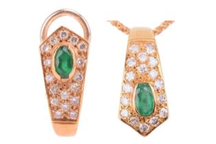 An emerald and diamond pendant on chain and a single matching earring; the pendant features an