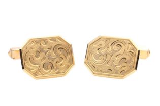 A pair of 9ct yellow gold Mappin and Webb cufflinks; the rectangular, cut-cornered plaques with