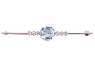 An Art Deco aquamarine and diamond bar brooch, featuring an octagonal step-cut aquamarine of light