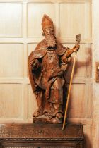 A 16th-century Flemish oak carved statue of a Bishop Saint, with later carved hands and staff, 123