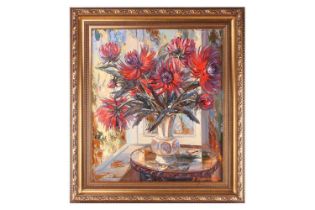 Russian School, Still life with red flowers on a circular table, indistinctly signed and dated 1993,