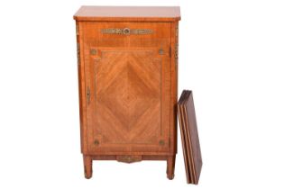 A Louis XVI style kingwood cabinet, the crossbanded top over a quarter veneered door with