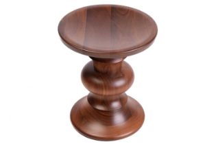 Charles and Ray Eames, a walnut 'Model B' stool, after the original design for Time Inc, 38 cm