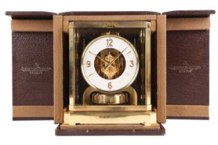 A Jaeger-LeCoultre Atmos Classic VIII gilt brass clock, serial number 224004, in original leather