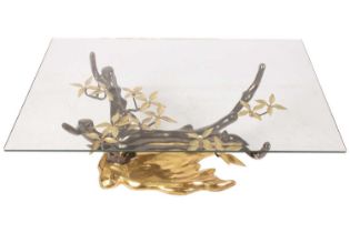 Willy Daro (20th century) French, a patinated brass and clear glass coffee table, the base formed as