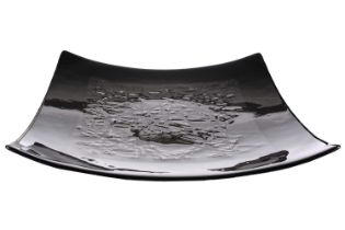 Kurt McVey (Contemporary) American, a square black glass platter, with embedded gilt design,