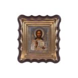 A Russian Christ Pantocrator icon, late 19th century, with pierced and engraved and gilt white metal
