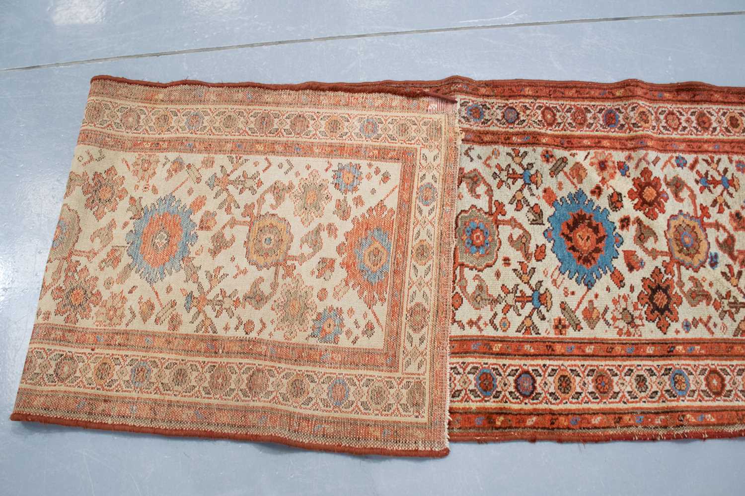An "Old Country House" ivory ground Malayer runner with large flower heads, within a tiled border, - Image 3 of 3
