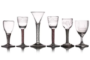 A pair of late 18th-century cotton twist ale glasses, with double red and white twist included plain
