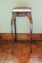 A George III mahogany kettle stand, with brushing slide on cabriole legs, 63 cm high x 28 cm wide at